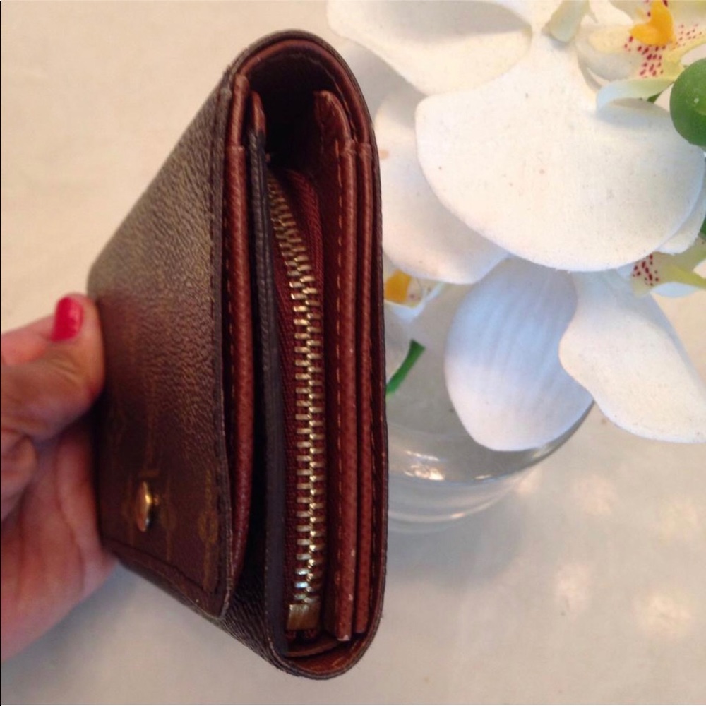 Louis Vuitton brown bi- fold wallet. Still a great go to wallet and very stylish